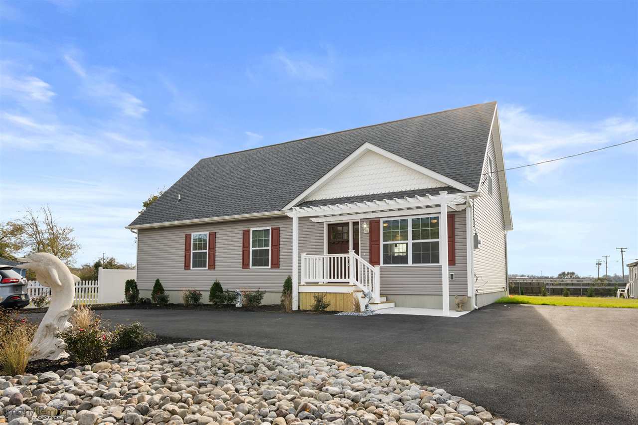 720 Town Bank Road North Cape May, NJ 08204 - Photo 1 of 1 a front view of a house with a yard