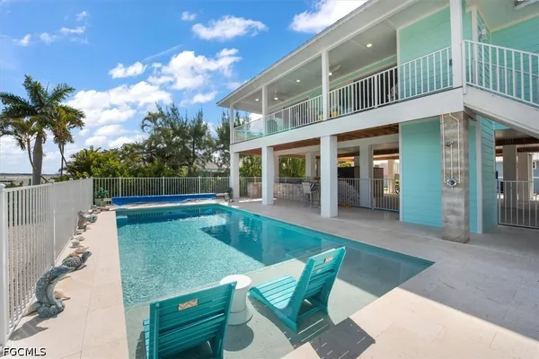 a view of a house with a swimming pool
