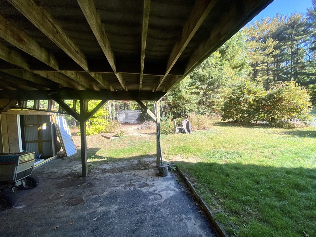 16 Peabody Road Shirley, MA 01464 - Photo 19 of 20 a view of a porch with furniture and a yard