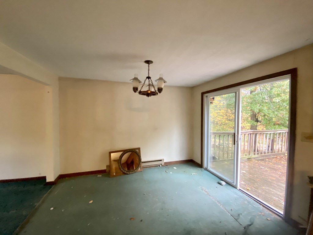 16 Peabody Road Shirley, MA 01464 - Photo 6 of 20 a view of a livingroom with a ceiling fan and window