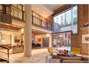 16 Jay Street, Unit 1 Manhattan, NY 10013 - Photo 1 of 1 a view of a lobby with furniture and floor to ceiling windows