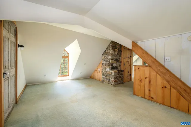 a view of porch with wooden floor