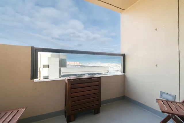 a view of cabinets and window