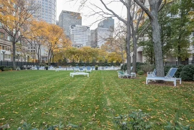 a view of a patio with a yard