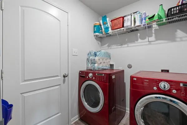 a utility room with dryer and washer