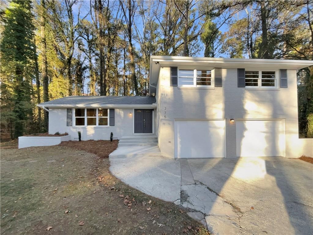 775 Peyton Road Southwest Atlanta, GA 30311 - Photo 1 of 1 front view of a house with a yard