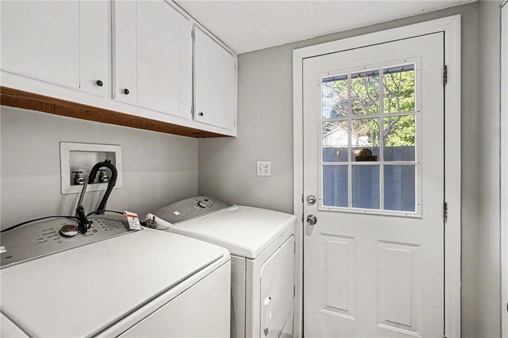 6052 WinterGreen Road Northwest Norcross, GA 30093 - Photo 9 of 24 a view of room with washer and dryer