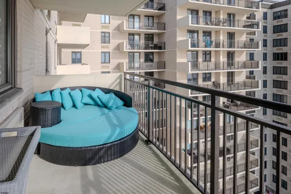 a view of a balcony with chair