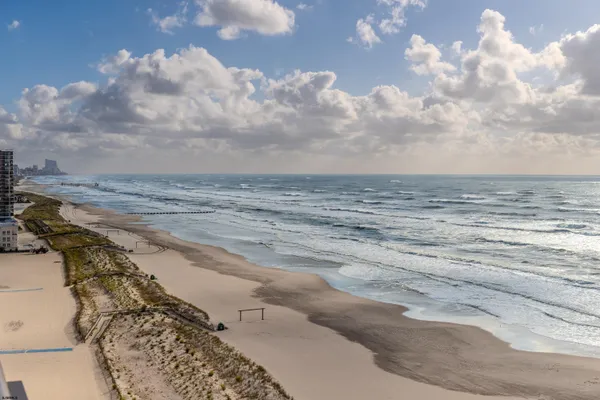 a view of beach and ocean