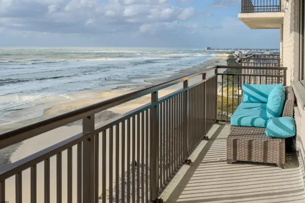 a balcony with an outdoor space