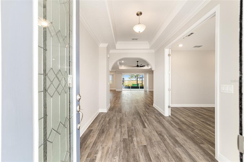 8176 Southwest 98th Terrace Road Ocala, FL 34481 - Photo 11 of 62 a view of a hallway view with wooden floor