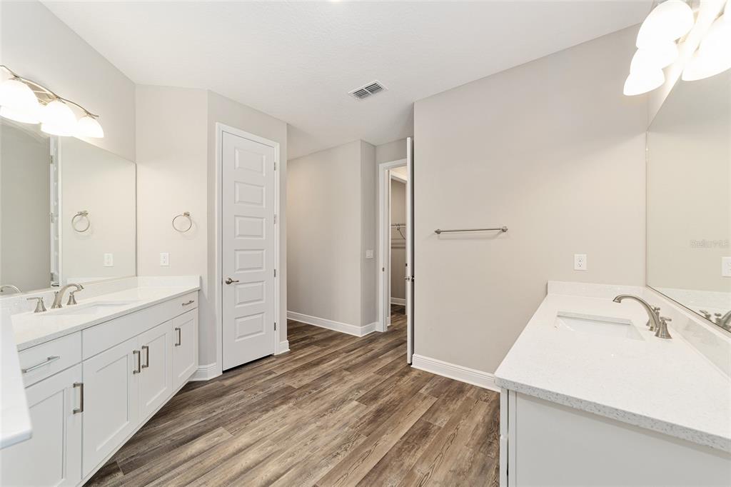 8176 Southwest 98th Terrace Road Ocala, FL 34481 - Photo 33 of 62 a bathroom with a sink and a mirror