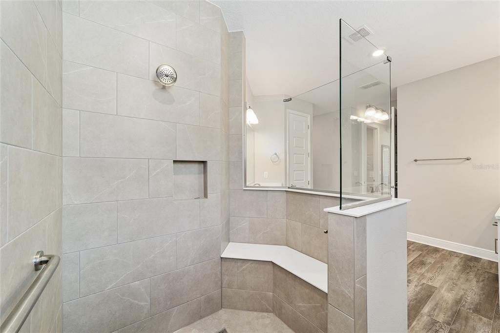 8176 Southwest 98th Terrace Road Ocala, FL 34481 - Photo 34 of 62 a bathroom with a shower and a mirror