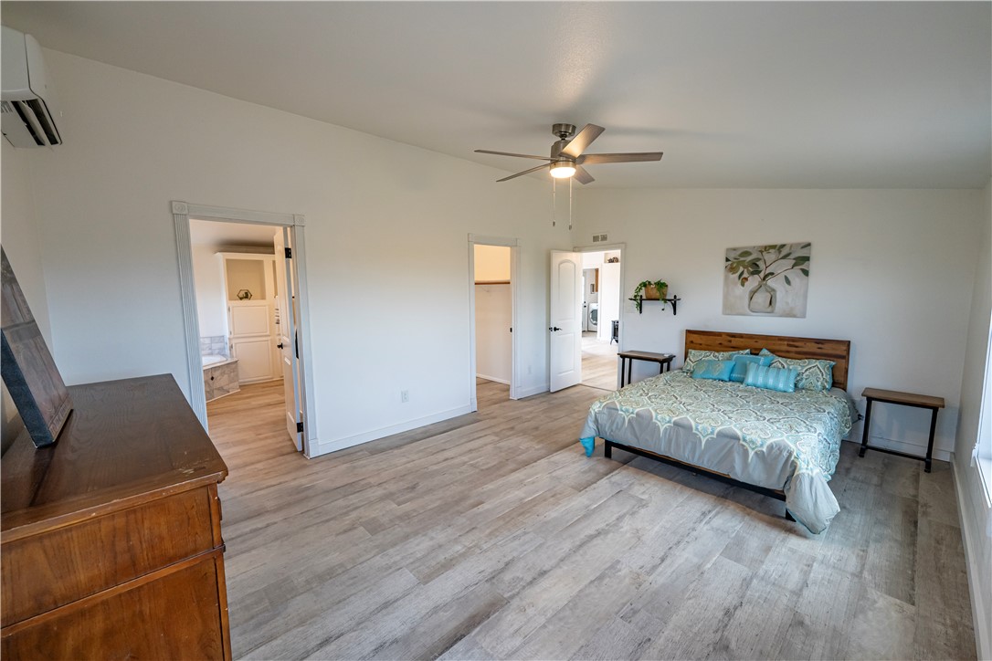 2765 North Silver Springs Road Kingman, AZ 86401 - Photo 32 of 60 a living room with furniture and a wooden floor