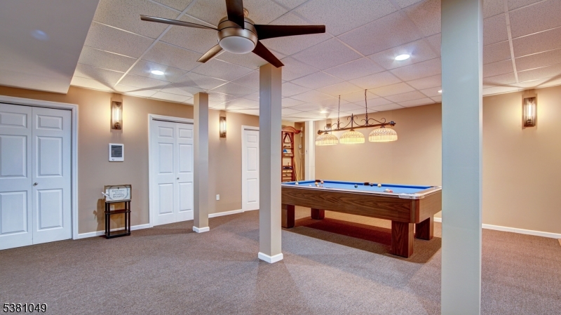 119 Broadway Road Cranbury, NJ 08512 - Photo 17 of 26 a room with pool table and windows