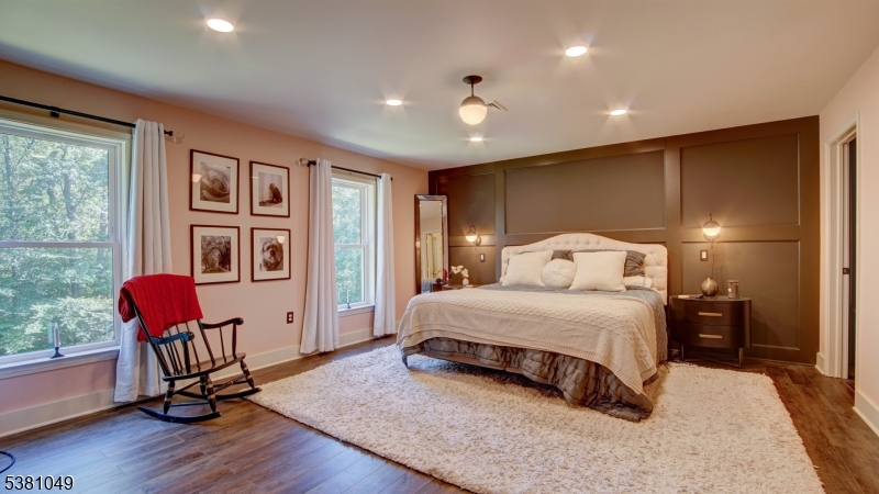119 Broadway Road Cranbury, NJ 08512 - Photo 21 of 26 a spacious bedroom with a bed and wooden floor