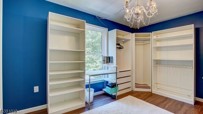 119 Broadway Road Cranbury, NJ 08512 - Photo 23 of 26 a view of walk in closet with empty racks