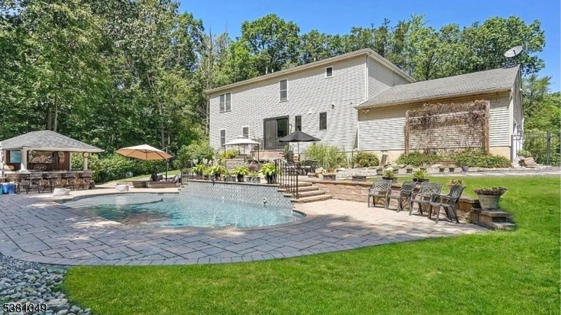 119 Broadway Road Cranbury, NJ 08512 - Photo 24 of 26 a view of a backyard with sitting area