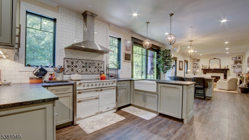 119 Broadway Road Cranbury, NJ 08512 - Photo 5 of 26 a kitchen with a sink appliances cabinets and a counter top space