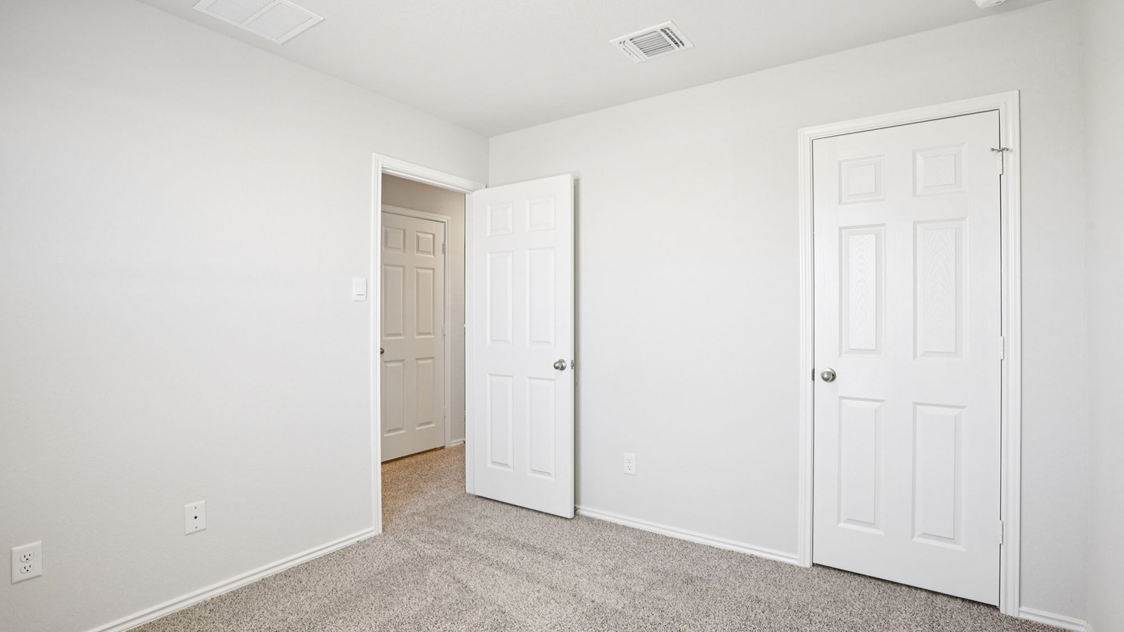 133 Wyatt Way Jarrell, TX 76537 - Photo 25 of 32 Neutral-toned room featuring light gray carpet flooring and white painted walls