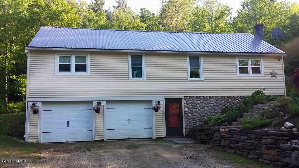 1288 Old Rte 9 Windsor, MA 01270 - Photo 1 of 21 a front view of a house with a yard