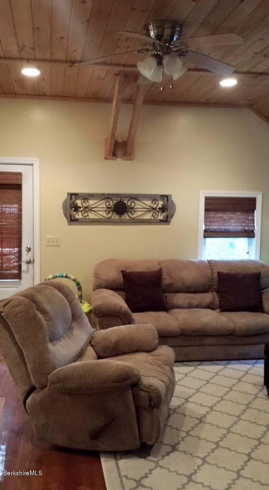 1288 Old Rte 9 Windsor, MA 01270 - Photo 14 of 21 a living room with furniture and a ceiling fan