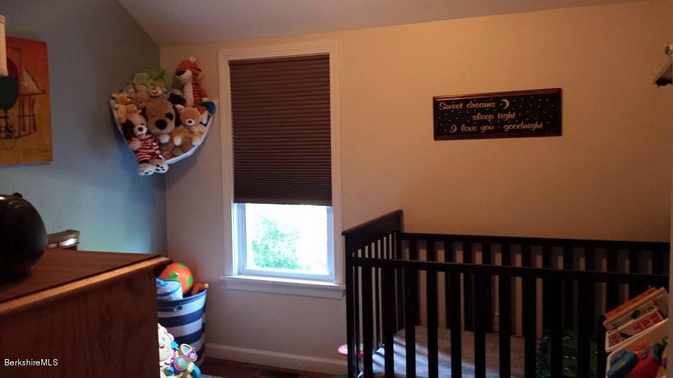 1288 Old Rte 9 Windsor, MA 01270 - Photo 16 of 21 a view of a hallway with wooden floor and a workspace