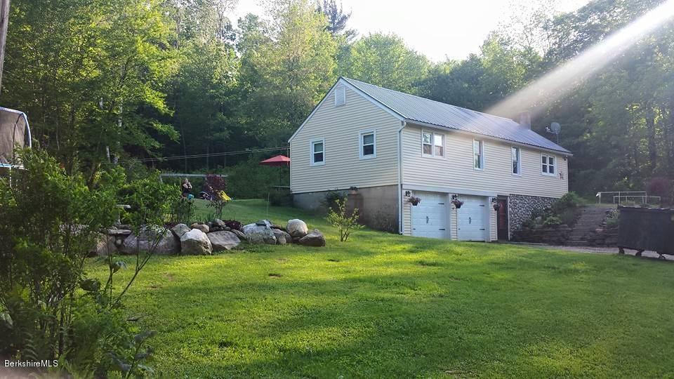 1288 Old Rte 9 Windsor, MA 01270 - Photo 3 of 21 a view of a house with a yard and sitting area
