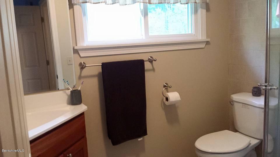 1288 Old Rte 9 Windsor, MA 01270 - Photo 21 of 21 a bathroom with a sink toilet and window