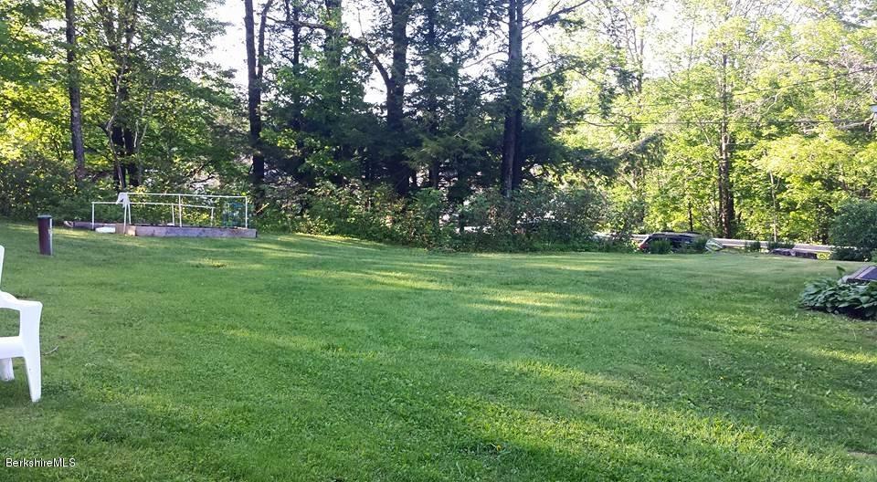 1288 Old Rte 9 Windsor, MA 01270 - Photo 6 of 21 a grassy field with trees in the background