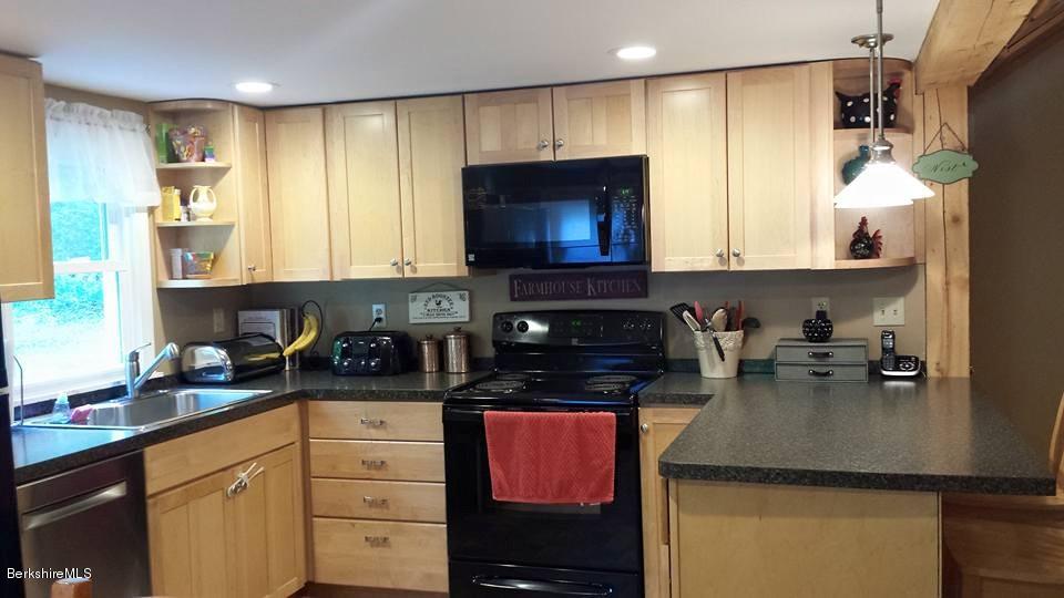 1288 Old Rte 9 Windsor, MA 01270 - Photo 9 of 21 a kitchen with sink a stove and cabinets