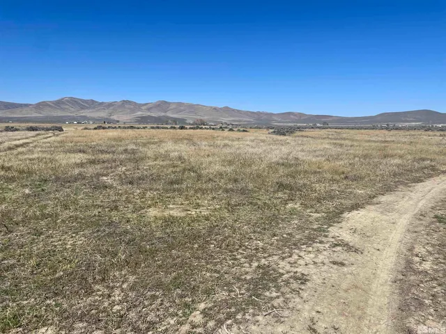 a view of a large body of water and mountain view