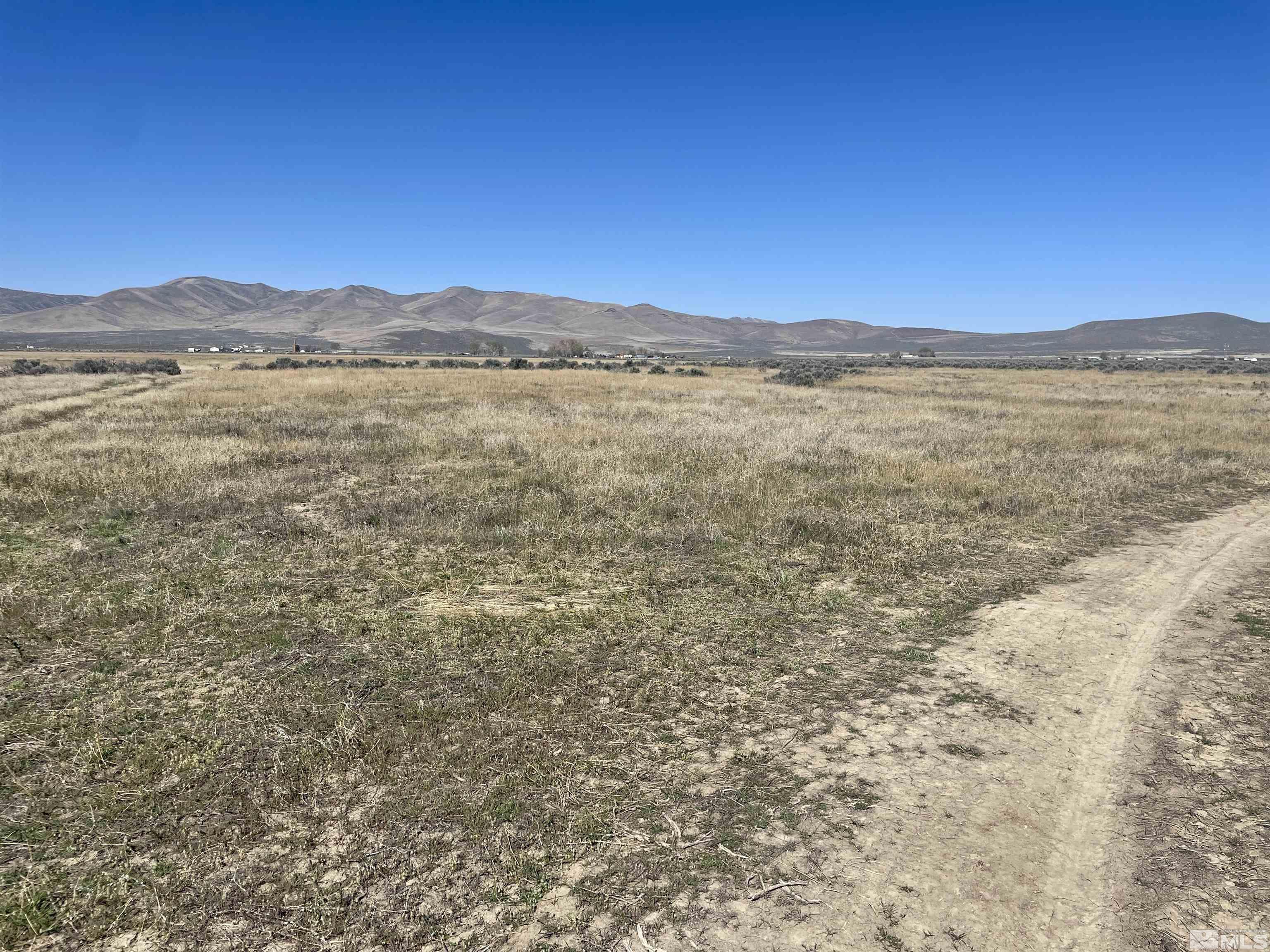6009210th Winnemucca, NV 89445 - Photo 3 of 7 a view of a large body of water and mountain view