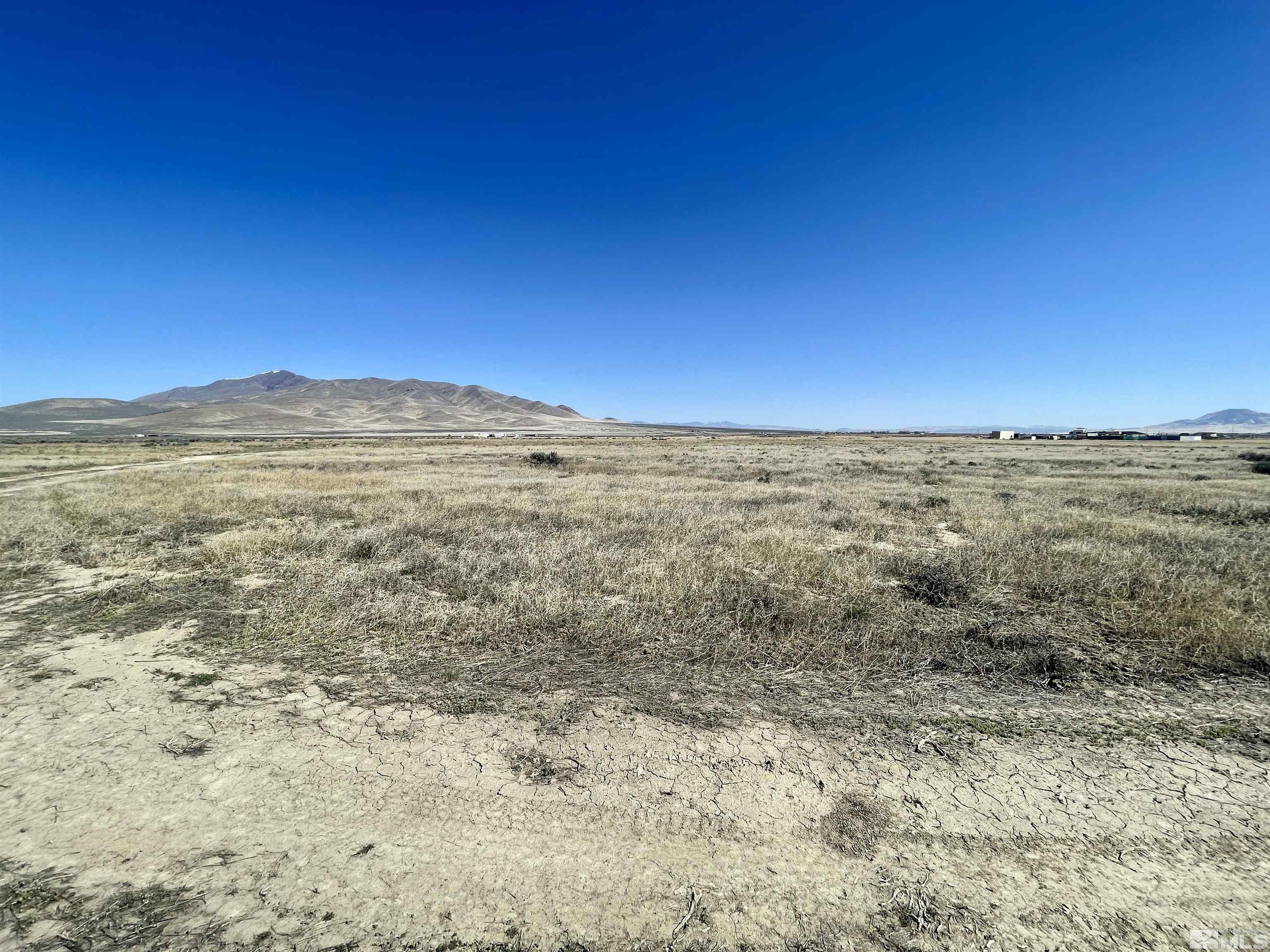 6009210th Winnemucca, NV 89445 - Photo 4 of 7 a view of ocean view with beach
