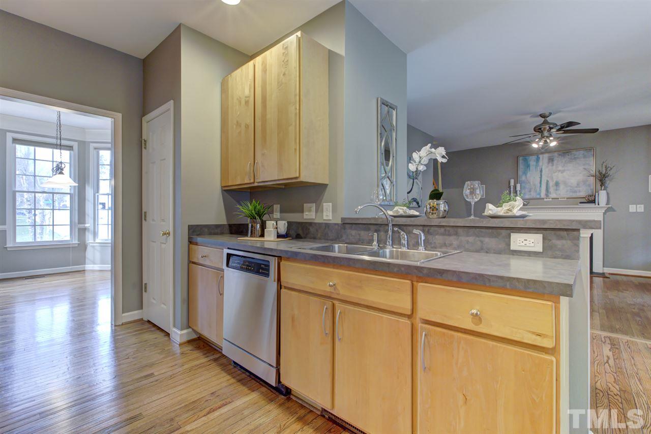 1403 Haventree Road Durham, NC 27713 - Photo 1 of 18 Kitchen is open to breakfast area and family room. There's a GAS cook-top and electric oven, STAINLESS appliances, large pantry and plenty of counter and cabinet space.