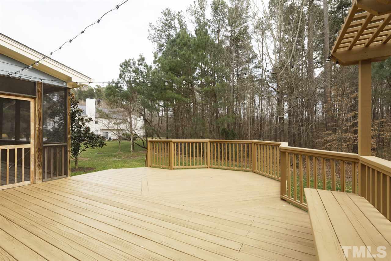 1403 Haventree Road Durham, NC 27713 - Photo 14 of 18 The deck is off the screen porch and has plenty of room for entertaining & grilling out. It overlooks the very private yard!