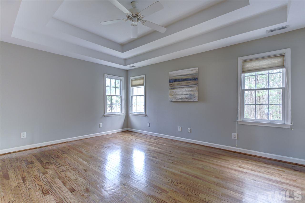 1403 Haventree Road Durham, NC 27713 - Photo 4 of 18 Hardwood floors and a gorgeous trey ceiling, the owners suite is very spacious and gets plenty of natural light.