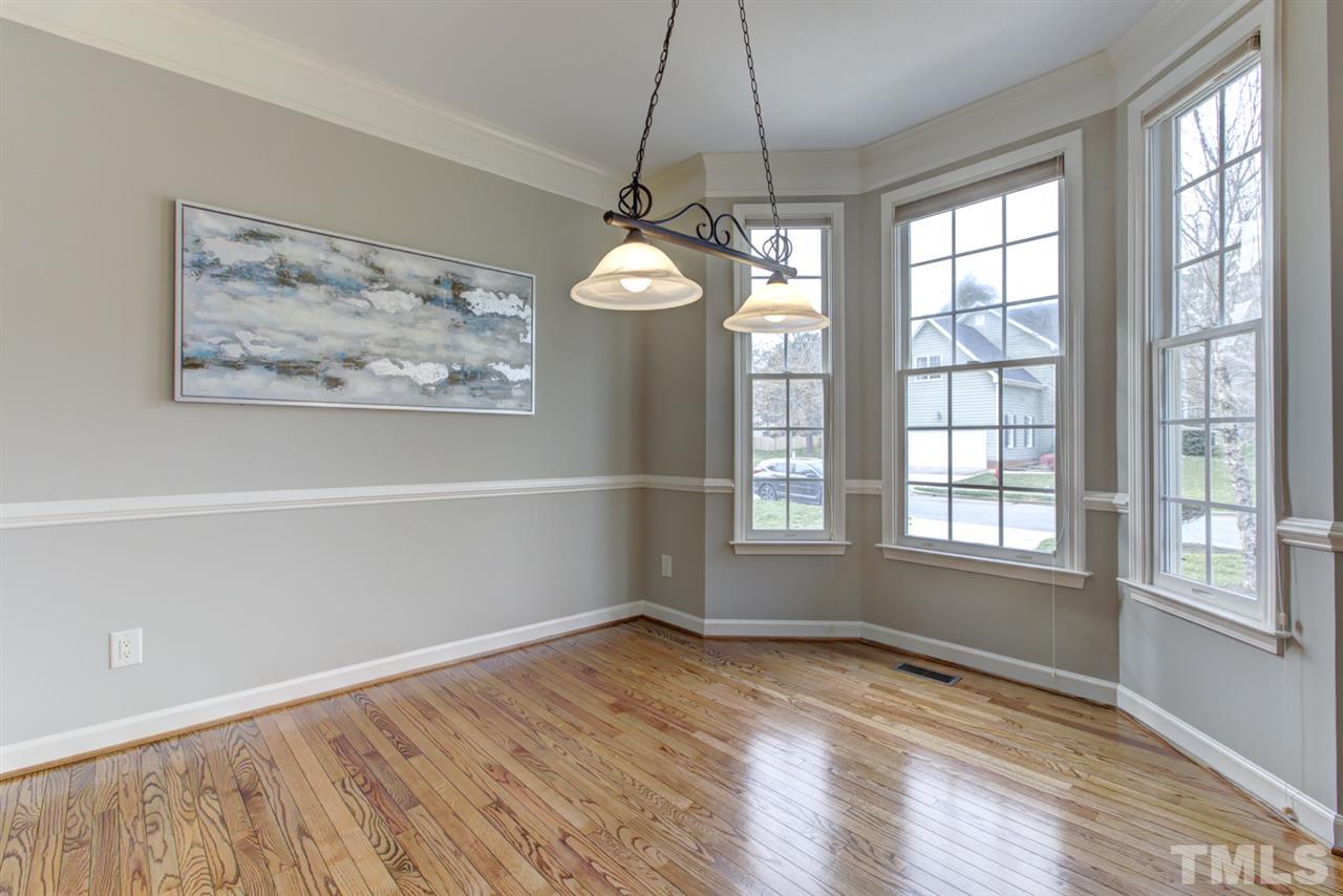 1403 Haventree Road Durham, NC 27713 - Photo 9 of 18 Options for the dining room - enjoy quiet family dinners and entertaining family & friends - this dining room has plenty of room for everyone!