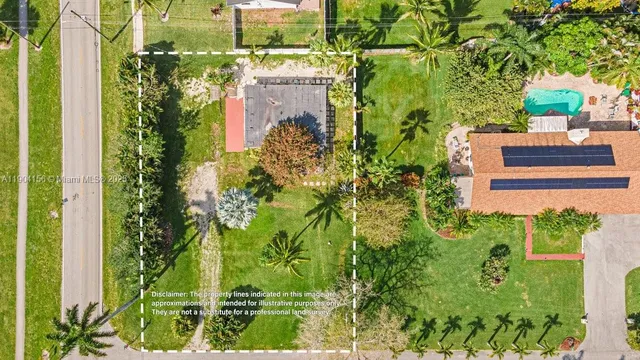 a view of an empty room with window and a bathroom