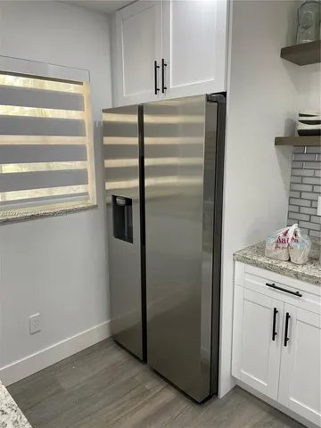 a room with storage and utility