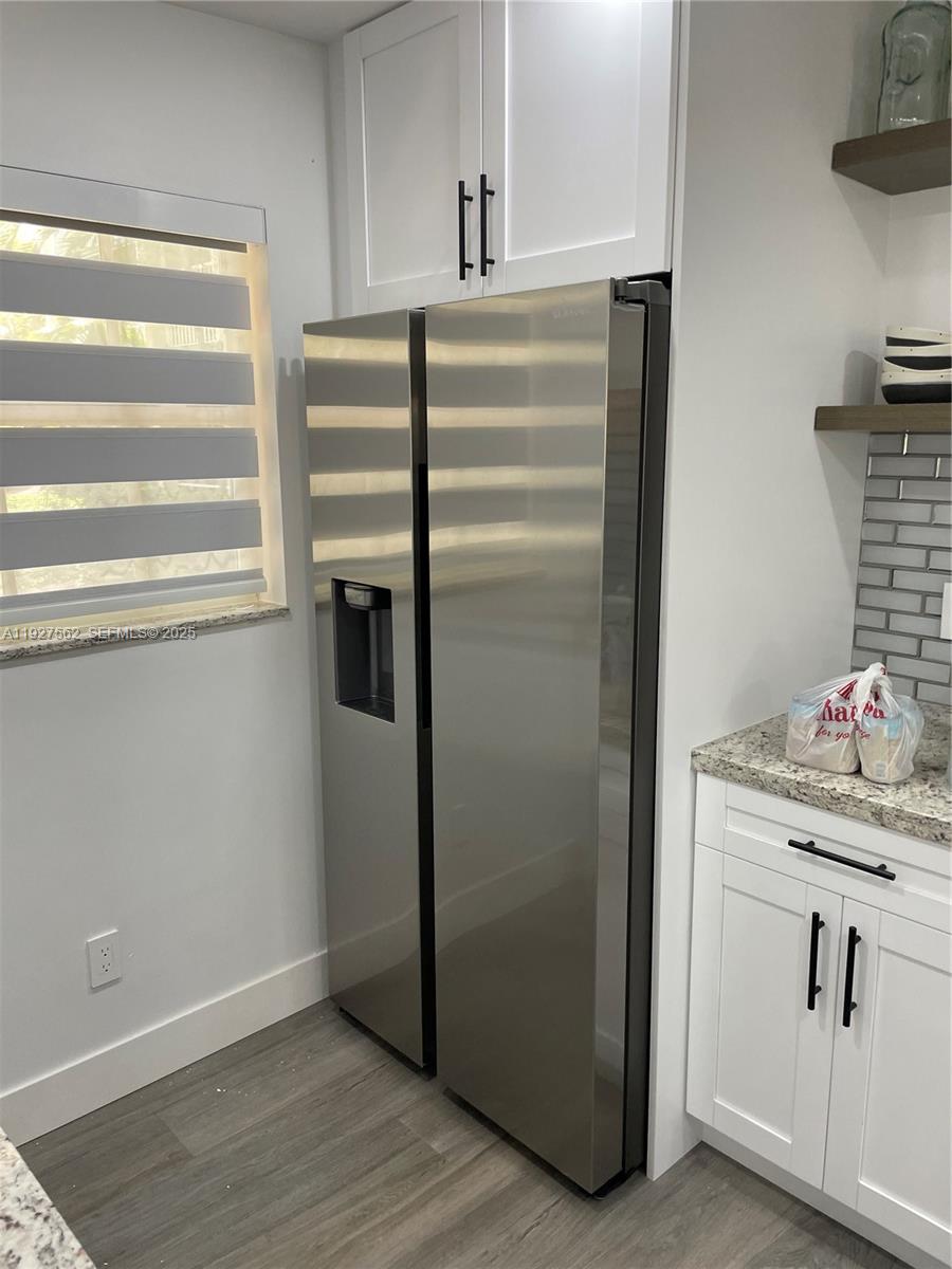 21121 Southwest 85th Avenue, Unit 109 Cutler Bay, FL 33189 - Photo 1 of 1 a room with storage and utility