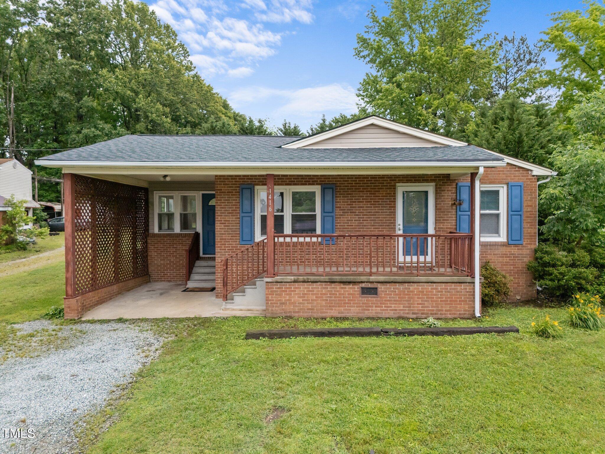1416 Chestnut Street Roxboro, NC 27573 - Photo 2 of 38 5-web-or-mls-DJI_20250521094908_0005_D