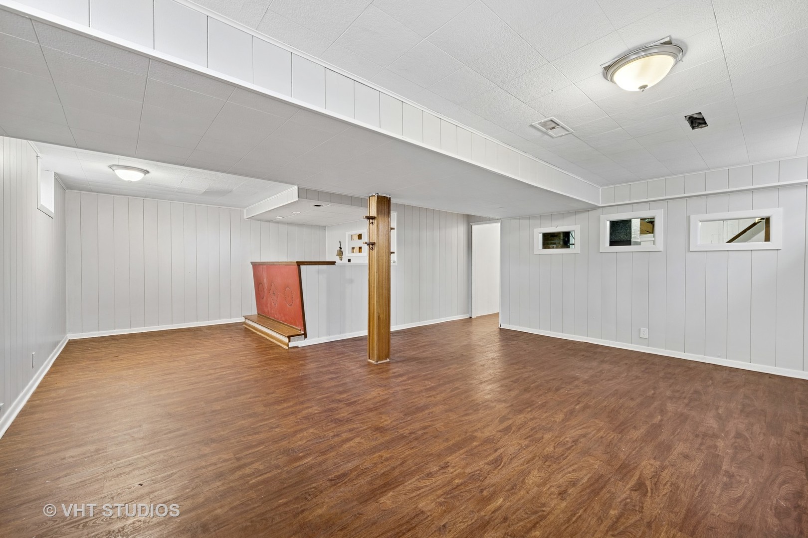 54 Burton Avenue Cary, IL 60013 - Photo 16 of 20 a view of an empty room with wooden floor