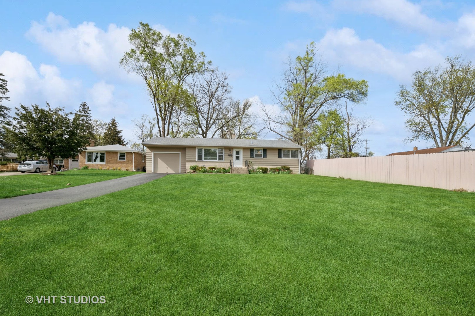 54 Burton Avenue Cary, IL 60013 - Photo 20 of 20 a view of house with a garden