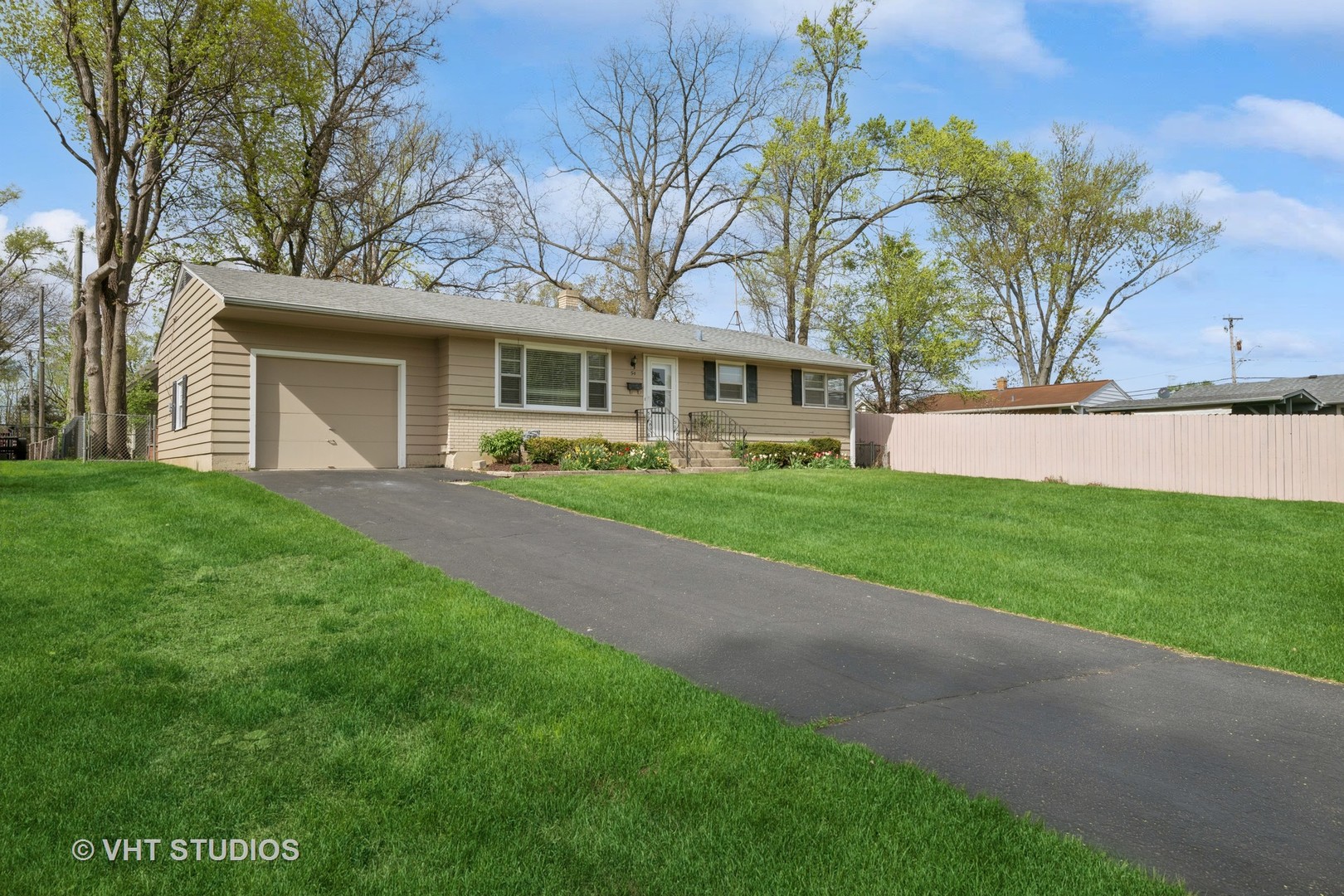 54 Burton Avenue Cary, IL 60013 - Photo 2 of 20 a front view of house with yard and green space