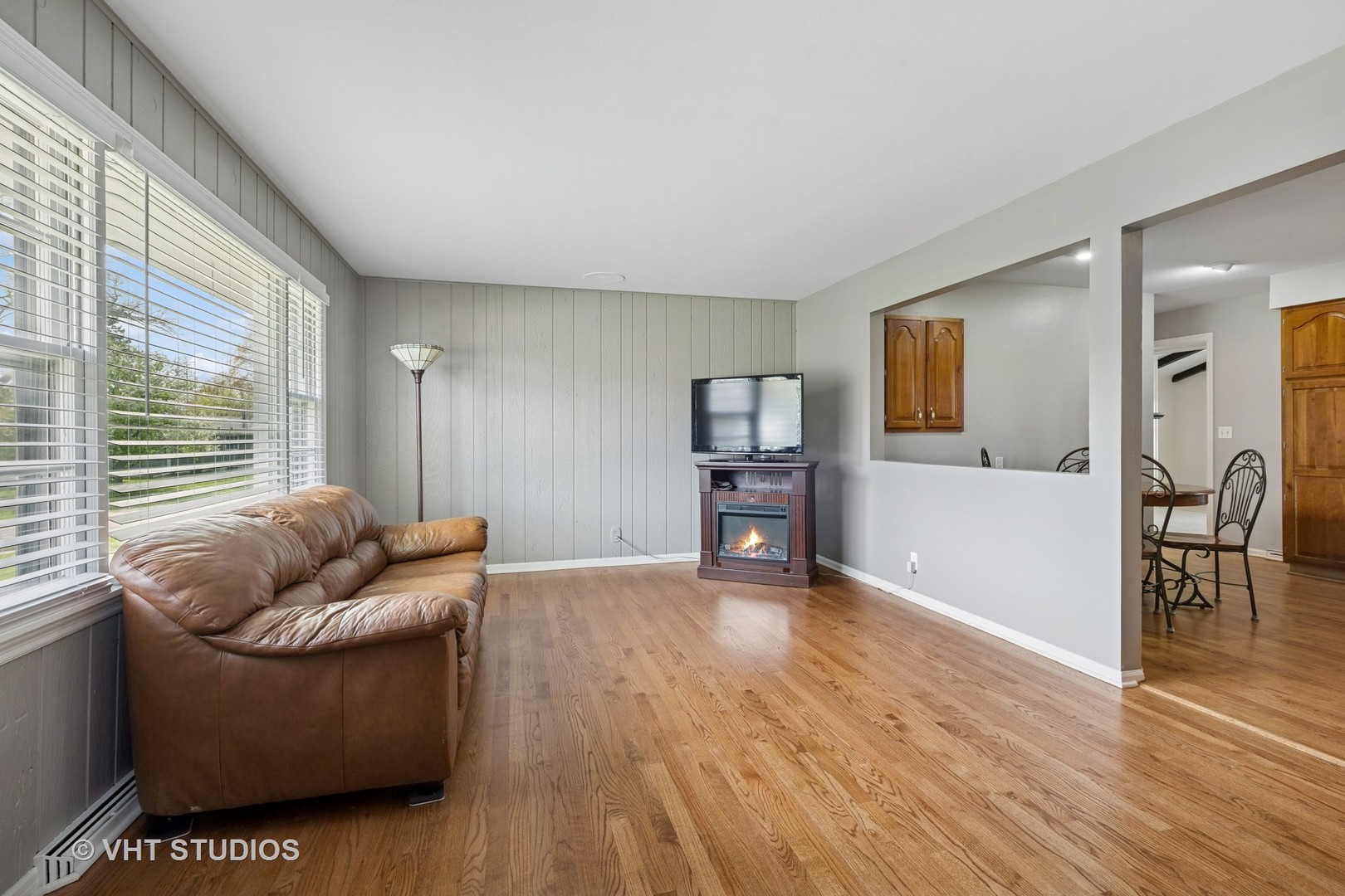 54 Burton Avenue Cary, IL 60013 - Photo 4 of 20 a living room with furniture and a wooden floor