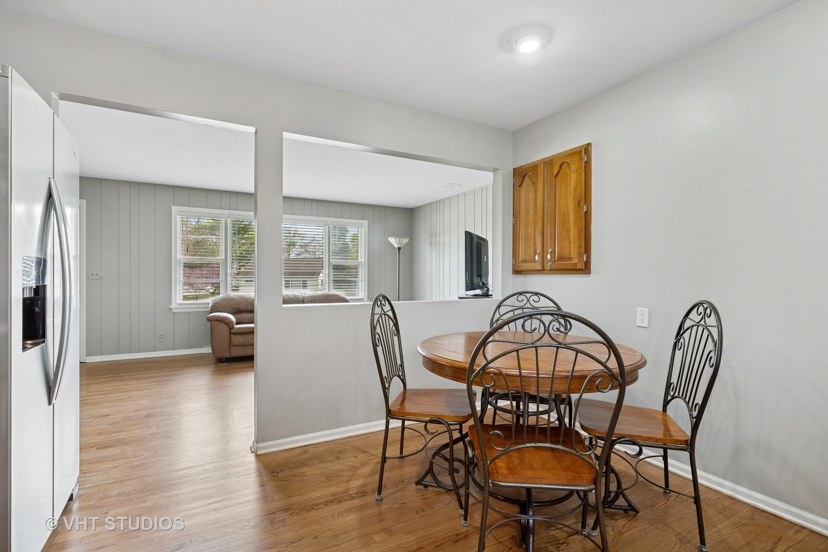 54 Burton Avenue Cary, IL 60013 - Photo 8 of 20 a view of a dining room with furniture and window