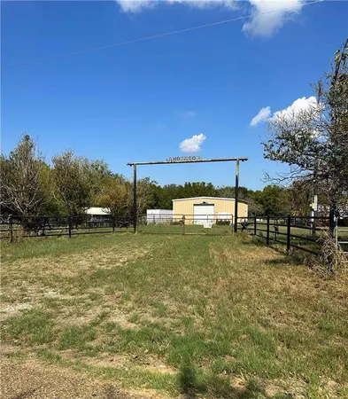a view of a lake from a yard