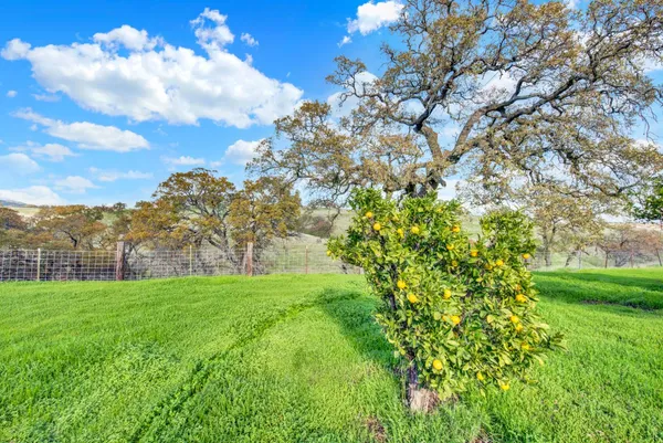 an aerial view of residential houses and outdoor space