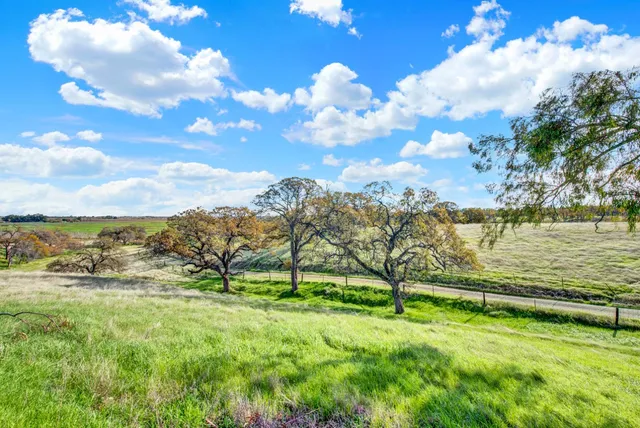 a view of a city with mountains in the background